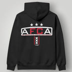 Black Ajax Amsterdam hoodie featuring a red circular crest logo and white drawstrings.