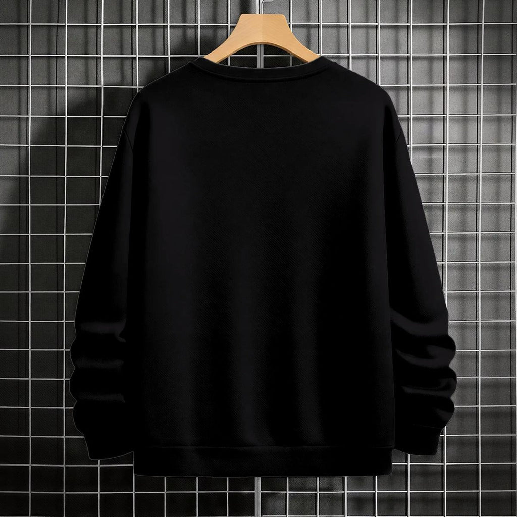 Black sweatshirt on a wooden hanger against a tiled wall background