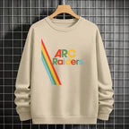Beige sweatshirt with 'ARC Raiders' design on a hanger against a tiled wall background