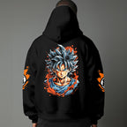 Black pullover hoodie with orange Goku silhouette on chest and vintage 1984 Dragon Ball graphics on sleeves, worn by model on grey background.